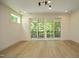 Bright bedroom with hardwood floors and sliding doors to balcony at 508 Lakeland St # A, Durham, NC 27701