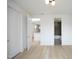 Light-filled bedroom with hardwood floors and access to a full bathroom at 508 Lakeland St # A, Durham, NC 27701
