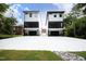 Two modern white houses with attached garages and screened porches at 508 Lakeland St # A, Durham, NC 27701