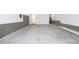 Spacious garage with concrete floor and ample storage at 508 Lakeland St # A, Durham, NC 27701