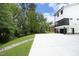 Modern white house with attached garage and screened porch, ample parking and private backyard at 508 Lakeland St # A, Durham, NC 27701