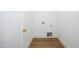 Convenient laundry closet with light wood flooring at 508 Lakeland St # A, Durham, NC 27701