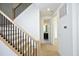 Modern staircase with light wood and black metal railing at 508 Lakeland St # A, Durham, NC 27701
