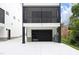 Modern garage with screened porch above at 508 Lakeland St # B, Durham, NC 27701