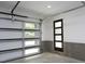 Garage with overhead door and access door at 508 Lakeland St # B, Durham, NC 27701