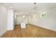 Open concept kitchen with island and hardwood floors at 508 Lakeland St # B, Durham, NC 27701