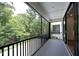 Spacious screened porch overlooking wooded backyard at 508 Lakeland St # B, Durham, NC 27701