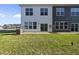 Open backyard featuring lush green grass and views of the surrounding community at 51 Pansy Park # 234, Clayton, NC 27520