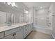 Bathroom with dual sinks, vanity, and a tub/shower combo at 51 Pansy Park # 234, Clayton, NC 27520