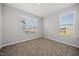 Comfortable bedroom with two windows offering plenty of natural light and views at 51 Pansy Park # 234, Clayton, NC 27520