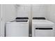 Bright laundry room with modern, front-load washer and dryer at 51 Pansy Park # 234, Clayton, NC 27520