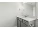 Stylish bathroom features a gray vanity, quartz countertop, and modern fixtures at 528 Ballast Pt, Clayton, NC 27520