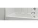 Clean white bathtub with modern fixtures and a sleek design at 528 Ballast Pt, Clayton, NC 27520