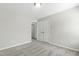 Well-lit bedroom boasting carpet and a closet for ample storage at 528 Ballast Pt, Clayton, NC 27520