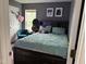 Teen bedroom features a cozy bed, colorful décor, and personal touches for a fun and inviting space at 5430 Neuse Ridge Rd, Raleigh, NC 27610