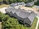 Aerial view of townhouses and surrounding area at 607 Marshskip Way, Rolesville, NC 27571