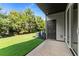 Private backyard with grassy lawn and patio at 607 Marshskip Way, Rolesville, NC 27571