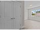 Bright bedroom with double doors and vinyl plank flooring at 607 Marshskip Way, Rolesville, NC 27571