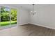 Spacious dining room with sliding glass doors leading to backyard at 607 Marshskip Way, Rolesville, NC 27571