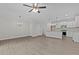 Open concept dining room with hardwood floors and chandelier at 607 Marshskip Way, Rolesville, NC 27571