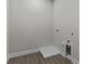 Laundry room with vinyl plank flooring and drain at 607 Marshskip Way, Rolesville, NC 27571