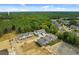 Aerial view of townhouses and surrounding community at 609 Marshskip Way, Rolesville, NC 27571