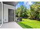 Private backyard with grassy lawn and patio at 609 Marshskip Way, Rolesville, NC 27571