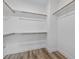 Spacious walk-in closet with ample shelving and hanging space at 609 Marshskip Way, Rolesville, NC 27571