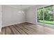 Dining room with hardwood floors and sliding glass doors to backyard at 609 Marshskip Way, Rolesville, NC 27571