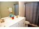 Bathroom with double vanity, shower, and toilet at 7713 Stonehenge Farm Ln, Raleigh, NC 27613
