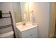 Clean bathroom with a single vanity and shower at 7713 Stonehenge Farm Ln, Raleigh, NC 27613