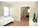 Cozy bedroom with a bonus room and carpet flooring at 7713 Stonehenge Farm Ln, Raleigh, NC 27613