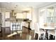 Bright kitchen with white cabinets and breakfast nook at 7713 Stonehenge Farm Ln, Raleigh, NC 27613