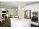 Modern kitchen features stainless steel appliances and an island at 7713 Stonehenge Farm Ln, Raleigh, NC 27613