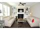 Spacious living room with fireplace and built-in shelving at 7713 Stonehenge Farm Ln, Raleigh, NC 27613