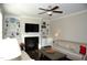 Comfortable living room with fireplace and built-in shelving at 7713 Stonehenge Farm Ln, Raleigh, NC 27613