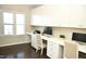 Home office with two work stations and ample storage at 7713 Stonehenge Farm Ln, Raleigh, NC 27613