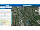 Aerial view of residential neighborhood, showing houses, roads, and green spaces at 8309 Stryker Ct, Raleigh, NC 27615