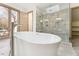 Elegant bathroom with freestanding tub and glass shower at 8309 Stryker Ct, Raleigh, NC 27615