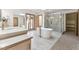 Spa-like bathroom with soaking tub and walk-in shower at 8309 Stryker Ct, Raleigh, NC 27615