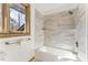 Simple bathroom with shower/tub combo and updated fixtures at 8309 Stryker Ct, Raleigh, NC 27615