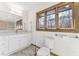 Clean bathroom with updated vanity, toilet and tile flooring at 8309 Stryker Ct, Raleigh, NC 27615