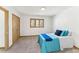 Cozy bedroom with blue bedding and ample closet space at 8309 Stryker Ct, Raleigh, NC 27615
