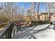 Spacious deck with seating area, overlooking a wooded backyard at 8309 Stryker Ct, Raleigh, NC 27615