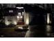 Modern house exterior at night, with lights illuminating the home and landscaping at 8309 Stryker Ct, Raleigh, NC 27615