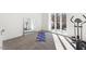 Bright home gym with large windows and exercise equipment at 8309 Stryker Ct, Raleigh, NC 27615
