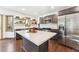 Updated kitchen with stainless steel appliances and large island at 8309 Stryker Ct, Raleigh, NC 27615