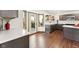 Updated kitchen, featuring hardwood floors and access to a deck at 8309 Stryker Ct, Raleigh, NC 27615