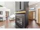 Living room with hardwood floors and a fireplace at 8309 Stryker Ct, Raleigh, NC 27615