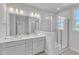 Clean bathroom, double vanity and large walk-in shower at 8951 Kennebec Crossing Dr # 51, Angier, NC 27501